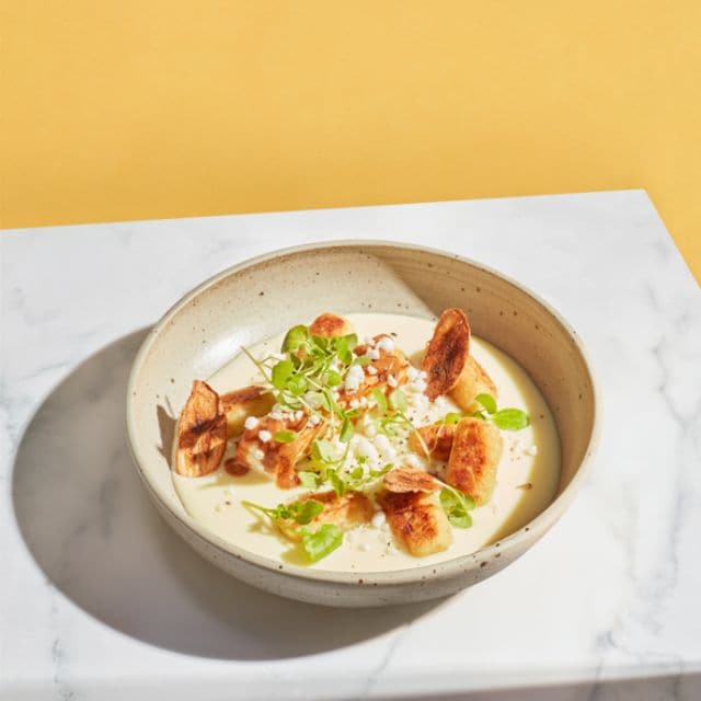 Ñoquis de tapioca con bechamel de tucupí y queso coalho